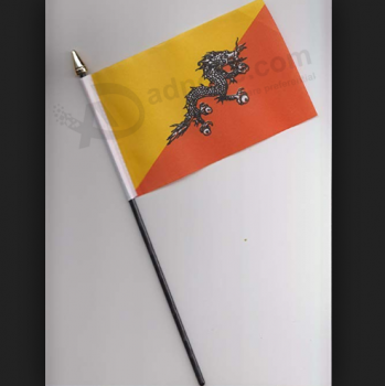 Mini bandera de Bután de mano de alta calidad con poste
