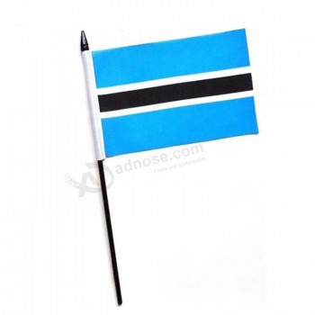 bandiera tenuta in mano professionale di parata di grande evento di elezione del paese del Botswana