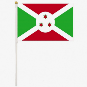 mini bandiera del Burundi tenuta in mano bandiera del Burundi