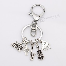 antiek zilver Ik hou van muziek piano saxofoon hanger muziekinstrumenten g-sleutel muziek charmes Auto gepersonaliseerde sleutelhangers Sleutelhangers sieraden