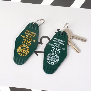 Großhandelsdoppelspitzenandenken keychain keytag Schlüsselkettenschlüsselring Die großen Nordhotelschmucksachegeschenke