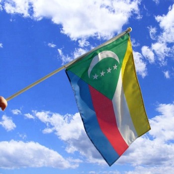 Festival use mini Comoros hand flag with flagpole
