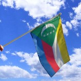 pólo de plástico mão bandeira de Comores para torcer esportes