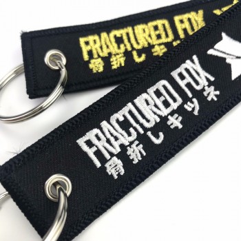 China manufacture promotional custom luggage embroidered tag key chains