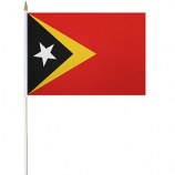 piccola mini bandiera timor orientale tenuta in mano Per gli sport all'aria aperta