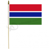 木の棒が付いている14x21cmのガンビアの手持ち型の旗