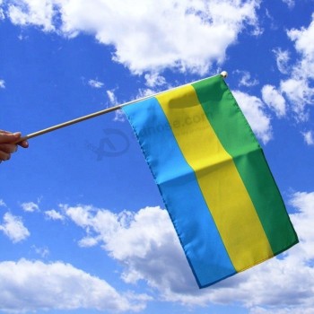 Габон ручной флаг, Габон 15-20см ручной флаг, мини-флаг Габона с черным флагштоком
