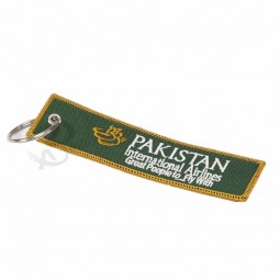 Großhandelspreiswertes kundengebundenes personalisiertes Gewebe bessert gesponnenes Doppelseitenstickerei keychain keyring keytag aus