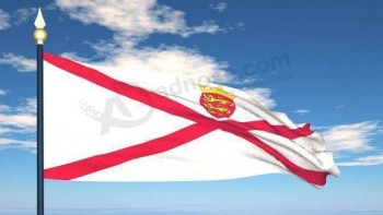 flag of jersey flying against a blue sky with moving clouds stock footage