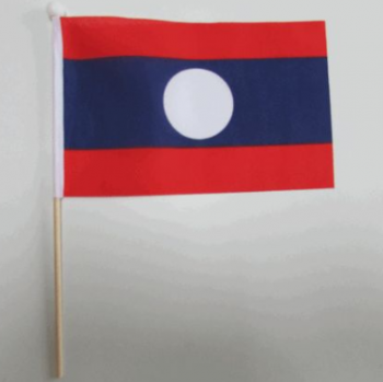 houten paal juichende hand held laos vlag fabriek