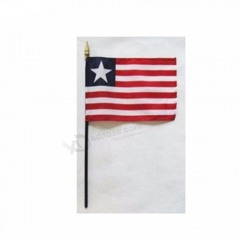 Venta caliente liberia palos bandera nacional 10x15cm tamaño mano agitando bandera