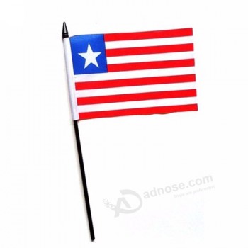 Hete verkoop aangepaste polyester afdrukken liberia hand wuivende vlag met zwarte paal