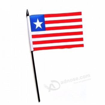 Hot sale custom polyester printing Liberia hand waving flag with black pole