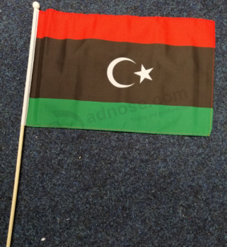 bandera nacional de la mano de libia bandera de palo de país de libia
