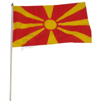 poliéster macedonia país mano ondeando bandera al por mayor