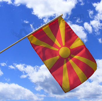 impressão digital pólo de madeira macedônia mão bandeira vara