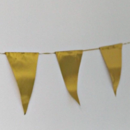 stamina in oro metallizzato con decorazione personalizzata a forma di triangolo
