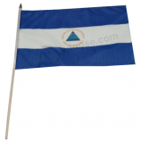 promotionele afdrukken polyester nicaragua hand held vlag