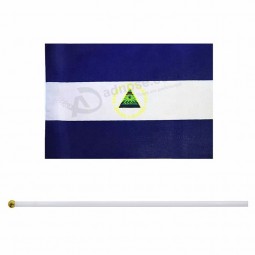 cheap promotional nicaragua hand stick flag For sale