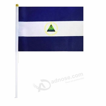 Tejido de poliéster poste de plástico blanco nicaragua pequeña bandera ondeando a mano