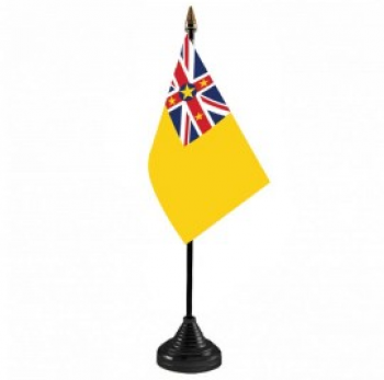 Base en plastique Niue Bureau Table Top Flag en gros
