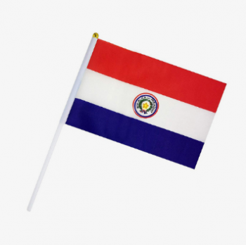 Vente en gros couleur imprimé Paraguay main agitant drapeau avec bâton