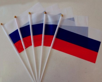 14 * 21cm mini drapeau russe tenu à la main