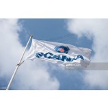 The Scania logo sits on a flag flying outside