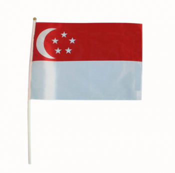 Utilisation en plein air Singapour main agiter le drapeau pour la promotion