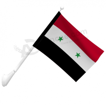 ポールと国家シリアの壁に取り付けられた旗