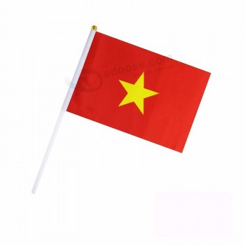 Échantillon gratuit Vietnam main tenue à la main Vague National Drapeau du pays