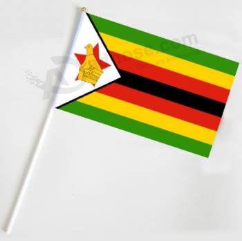 mini bandeira do zimbabwe mão bandeira do zimbabwe agitando bandeira