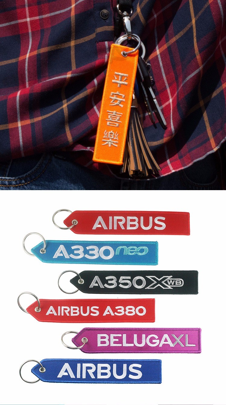 도매 패션 디자인 사용자 정의 직물 자카드 짠 로고 패치 열쇠 고리 제거 전에 비행 섬유 자수 짧은 끈 키 체인