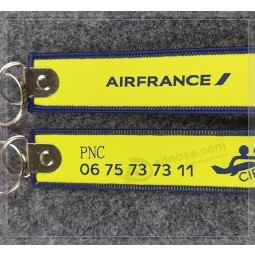 Portachiavi in ​​tessuto personalizzato con logo per indumento