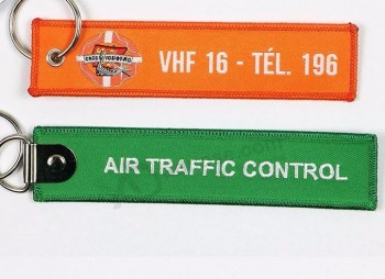 Porte-clés tissé en polyester avec logo personnalisé avec surjet à œillets