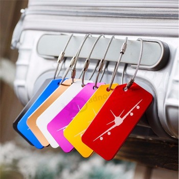 kleurrijke bagagelabels met vervangbare informatienota voor het schrijven van naam en adressen