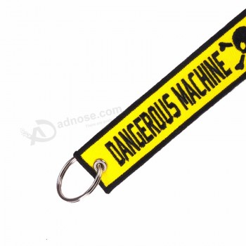 危険な機械の警告タグキーホルダーまたは工場のオートバイと車の安全キータグ黄色の刺繍危険スカルキーリング