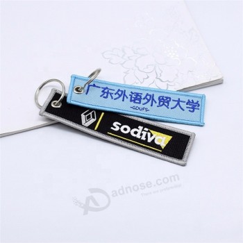 飞行前使用的自定义品牌名称徽标刺绣面料飞机钥匙扣