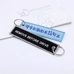 Brand Name Travel Souvenir Woven Embroidery Logo Fabric Keychains