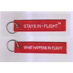 Was passiert? Aufenthalte während des Fluges Kundenspezifische OEM-Stoff-Schlüsselanhänger während des Fluges (In-Flight TM)