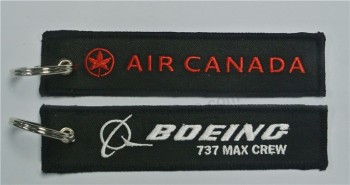 エアカナダボーイング737 Maxクルーメローボーダー付きカスタム刺繍キーホルダー