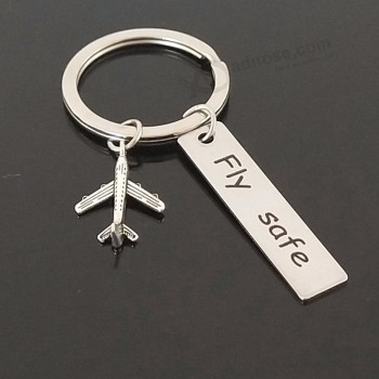 Nouveau porte-clés en métal lettrage FLY SAFE hommes femmes porte-clés hôtesse de l’air cadeau pilote d’avion porte-clés pendentif