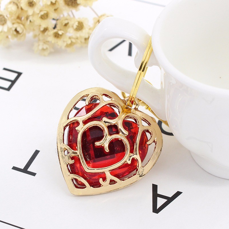 The-Legend-Of-Zelda-Key-Chain-Hollow-Alloy-Gold-Frame-Red-Blue-Acrylic-Love-Heart-Keychain (4)