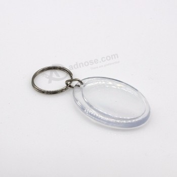 Porte-clés en plastique de promotion la moins chère en forme d’ovale en acrylique porte-clés photo vierge porte-clés