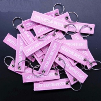 20pcs/lot Size7.7 * 2cm Porte-clés Aviation Cadeau KISS ME BEFORE FLIGHT Avertissement Hommes Pendentif Duplex Tissé étiquette Femmes Voiture Porte-clés