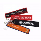 groothandel goedkope aangepaste stof Key Tag borduurwerk gepersonaliseerde sleutelhangers tag
