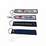 groothandel mode op maat gepersonaliseerd borduurwerk / bedrukte gepersonaliseerde sleutelhangers tag met logo op maat
