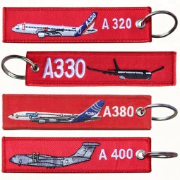 Porte-clés brodé avion personnalisé Tissu tissé avion porte-clés personnalisés