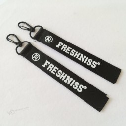 High quality black embroidered/woven personalized keychains with your logo