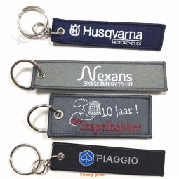 promotionele borduurwerk sleutelhanger, souvenir borduurwerk sleutelhanger met logo, aangepaste borduurwerk sleutelhanger produceert in China